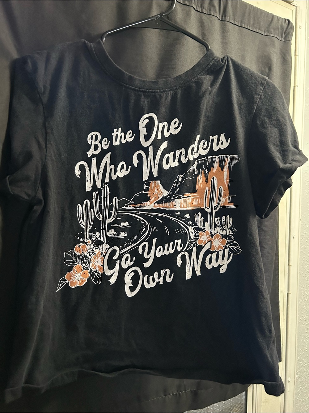 Graphic Tee - Black 'Be the One Who Wanders'